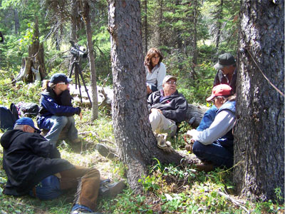 Blackfeet hunters work with BARA archaeologists at a historic campsite in Hungryman Creek, MT, August 12, 2006